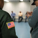 U.S. Immigration and Customs Enforcement (ICE) officers watch over detainees at a facility in Manhattan.